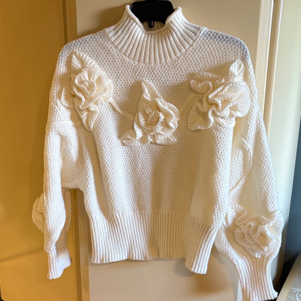 Elegant White Sweater with Floral Accents